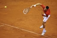 Novak Djokovic plays Olivier Rochus in a Davis Cup match in Charleroi on February 1, 2013
